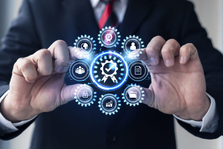 Hands interacting with digital interface showing icons for HR automation software functions like employee records, compliance, and data security