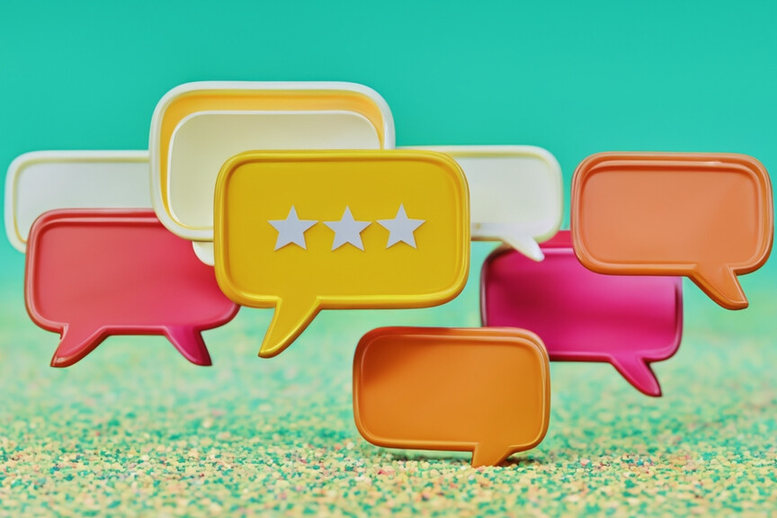 Colorful speech bubbles with stars representing customer reviews, tied to Deel review of HR and payroll platform.