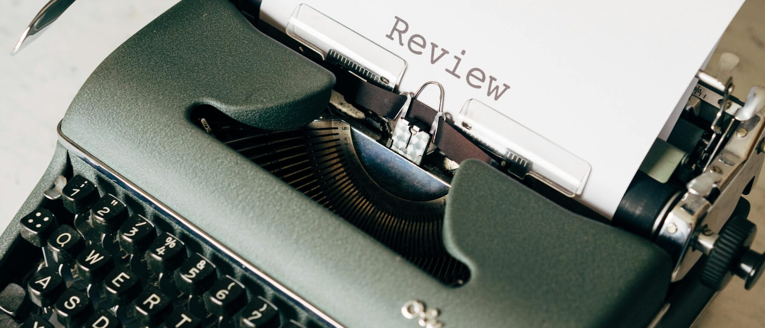 Typewriter with a paper titled 